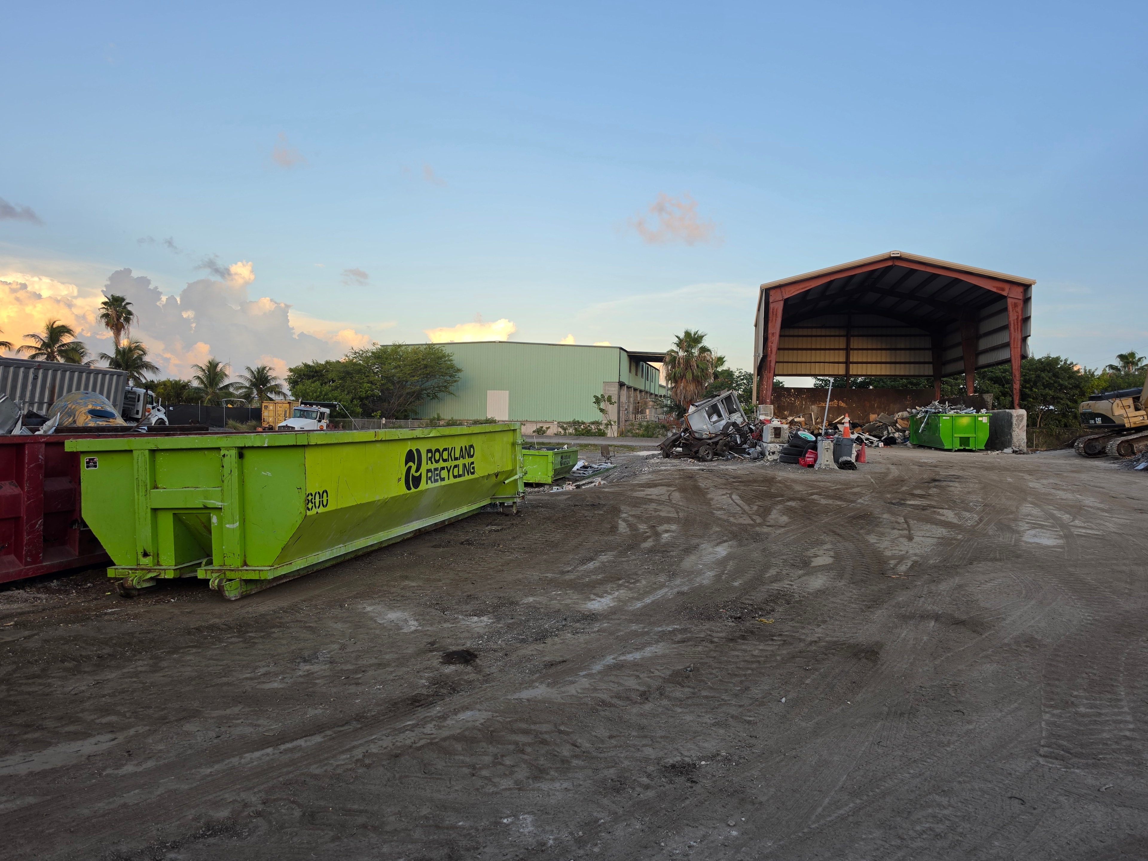 Rockland Recycling yard with green dumpster and open-air facility